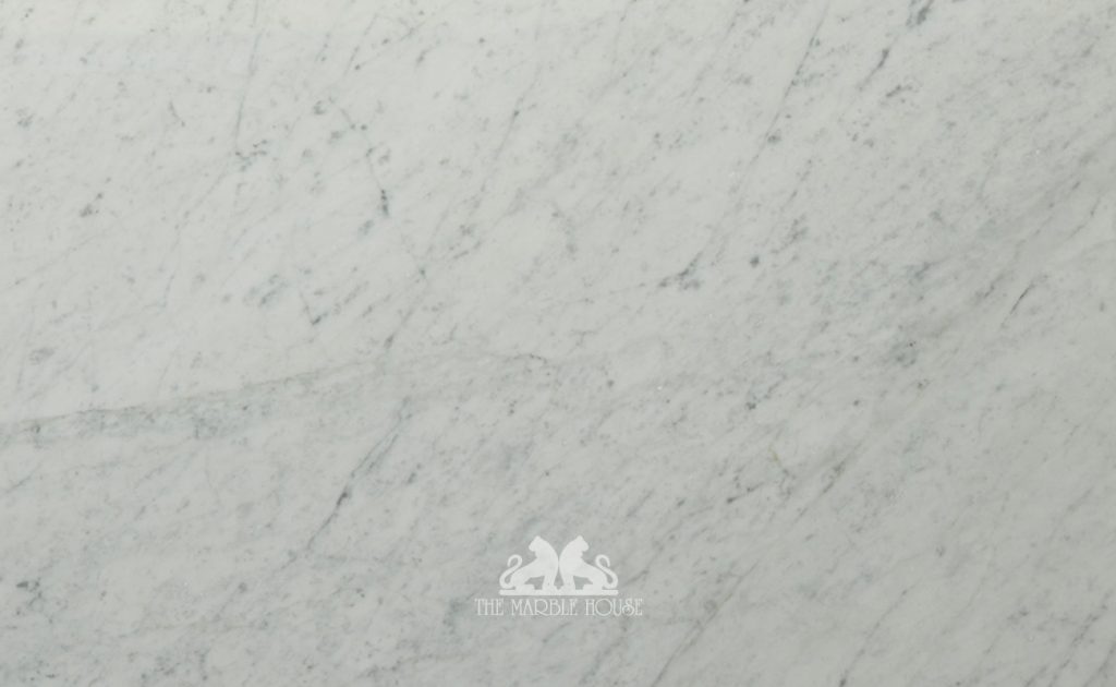 White Carrara marble and granite. Carrara marble slabs. Carrrara marble white. The Marble House, Melbourne, Australia.
